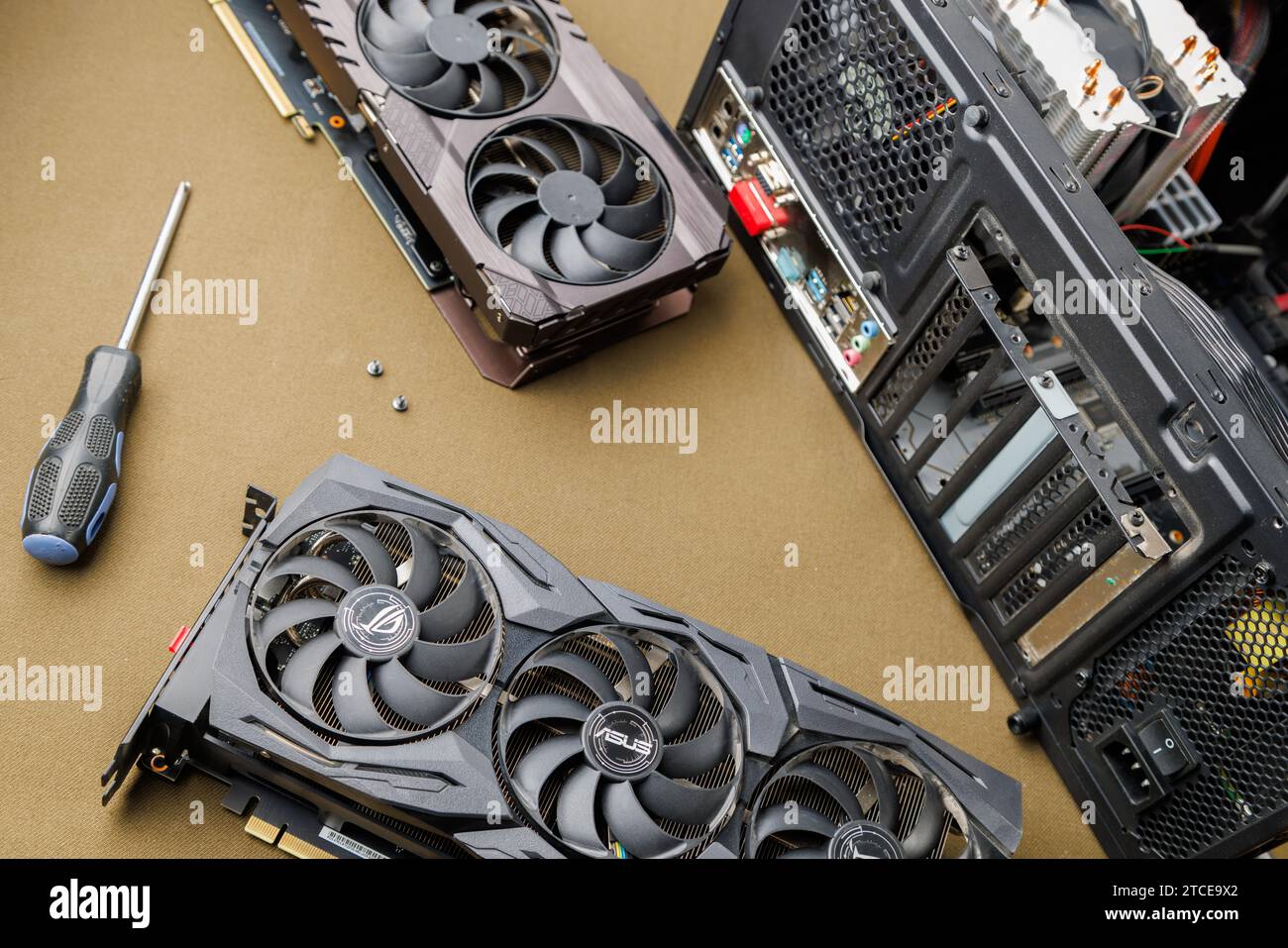 graphics card upgrading concept, two gaming graphics cards near desktop ...