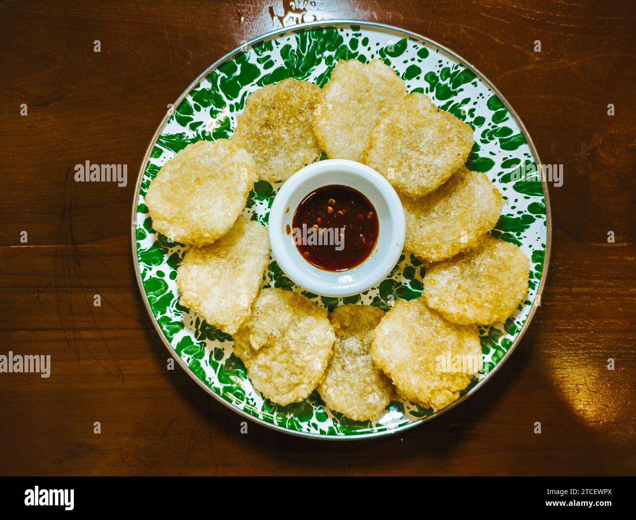 Cireng stands for Aci Goreng that mean Fried Tapioca Flour. Indonesian popular street food. Flat lay or top view. Stock Photo