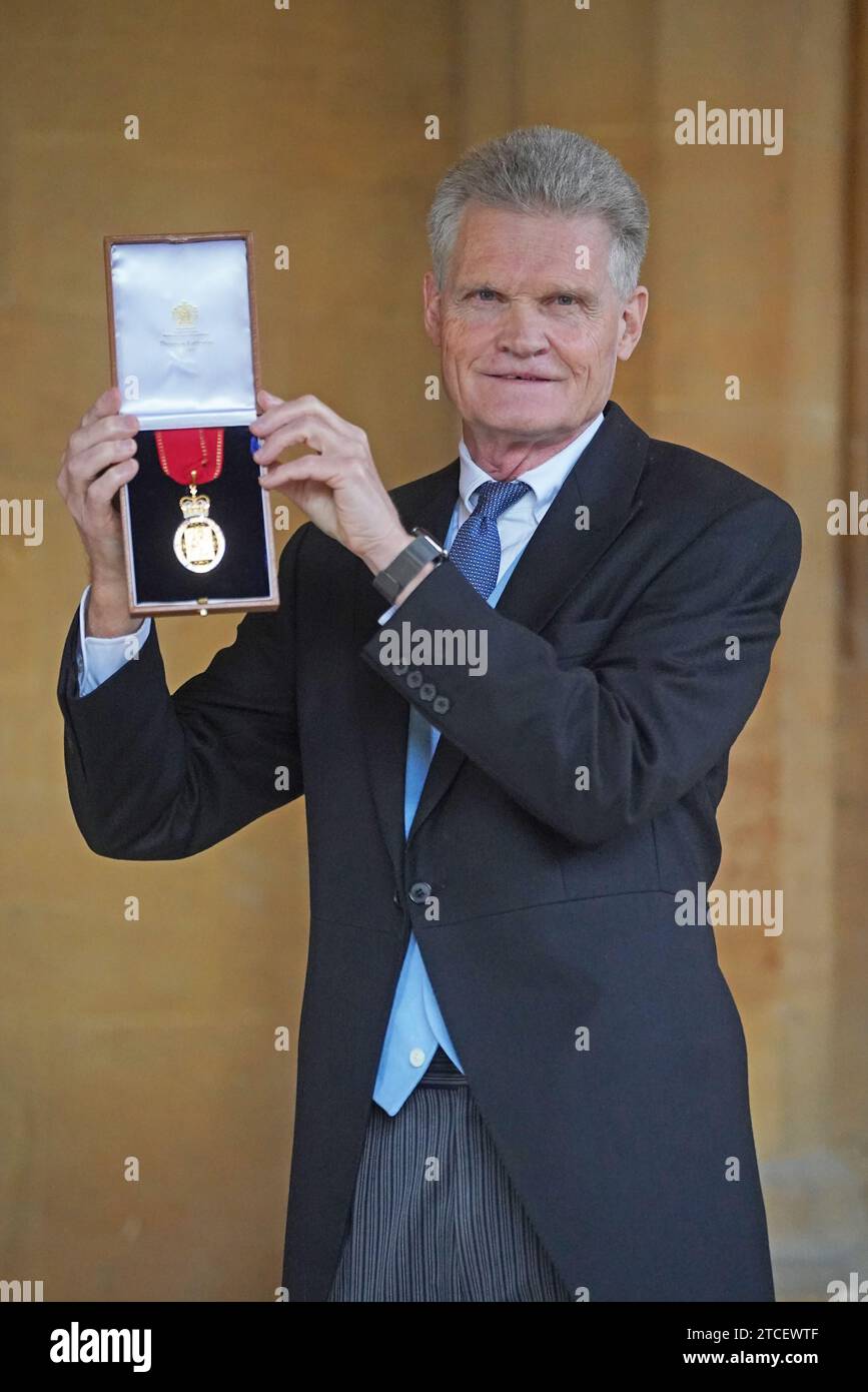Professor Sir John Bell after being made a Companion of Honour during an investiture ceremony at Windsor Castle, Berkshire. Picture date: Tuesday December 12, 2023. Stock Photo
