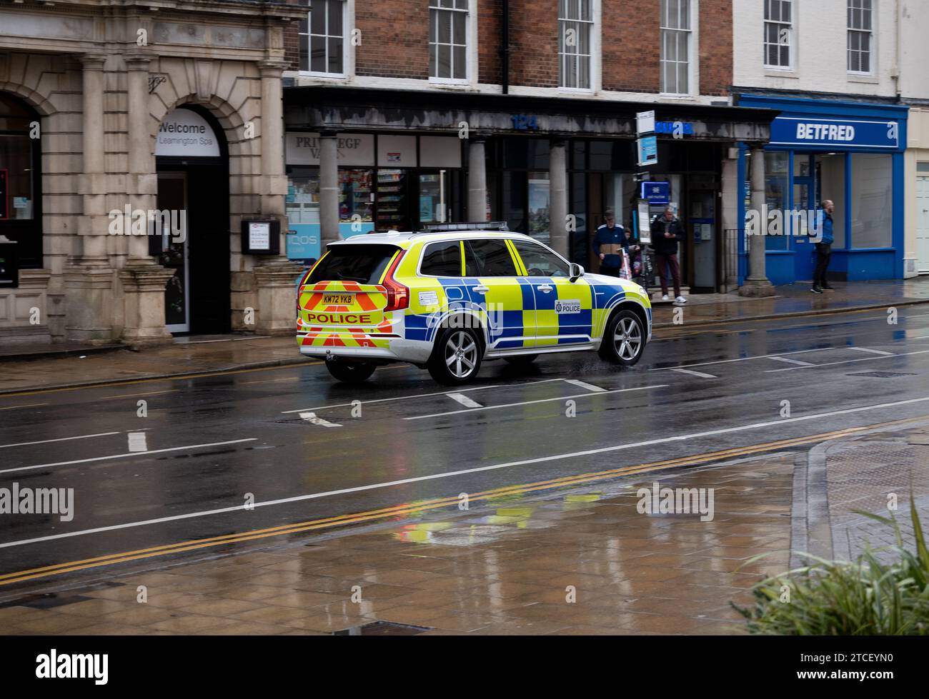 Warwickshire Police car in wet weather, The Parade, Warwickshire, UK Stock Photo