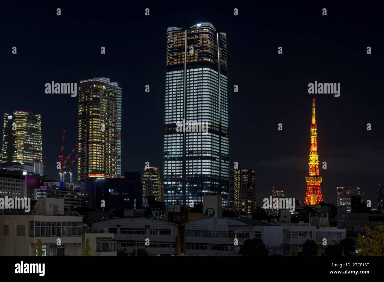 night view of the famous Tokyo tower and other skyscrapers Stock Photo