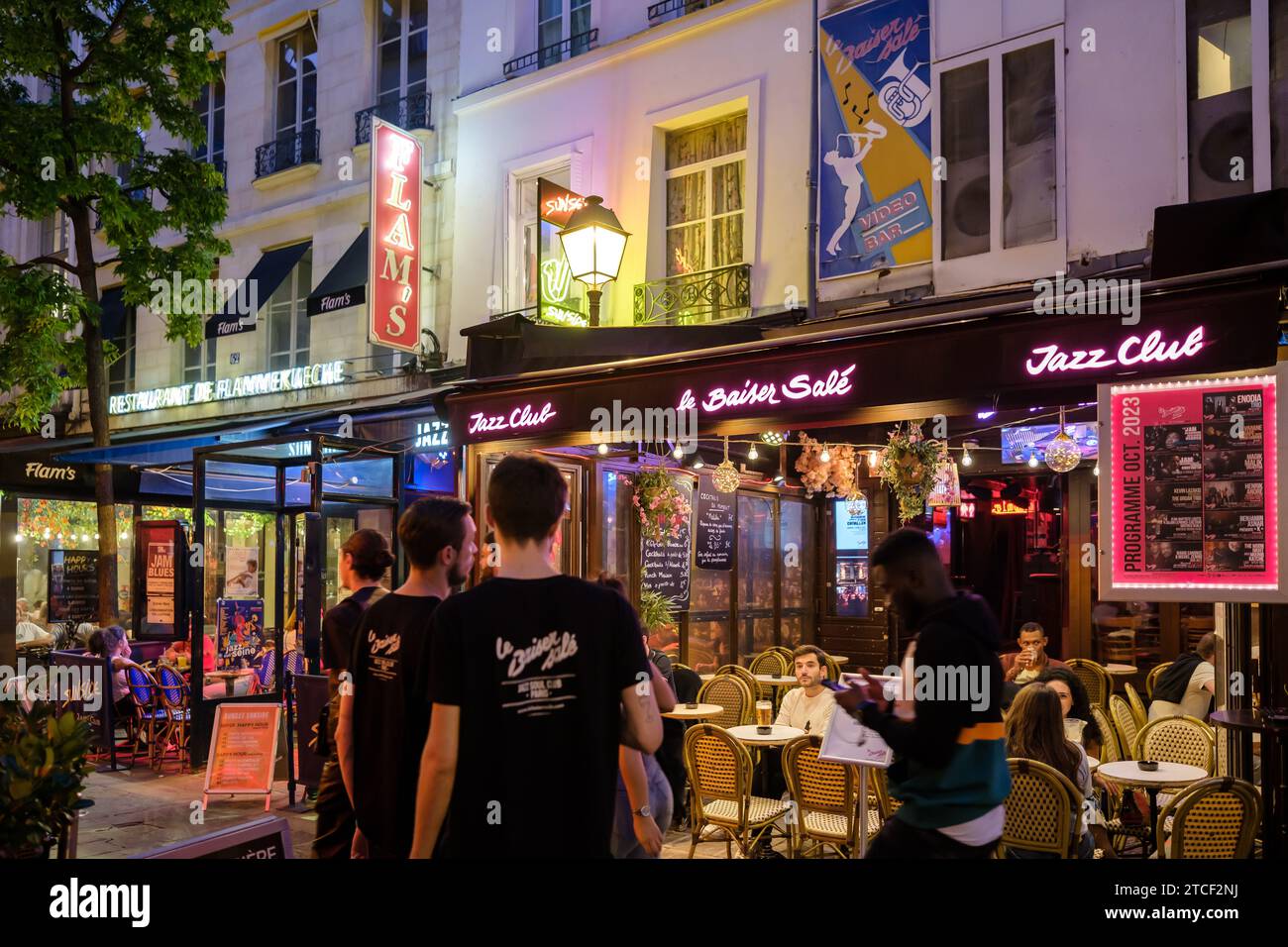 Paris, France - October 8, 2023 : View of people enjoying drinks outdoors at a famous jazz bar in the popular area of Chatelet in Paris France Stock Photo