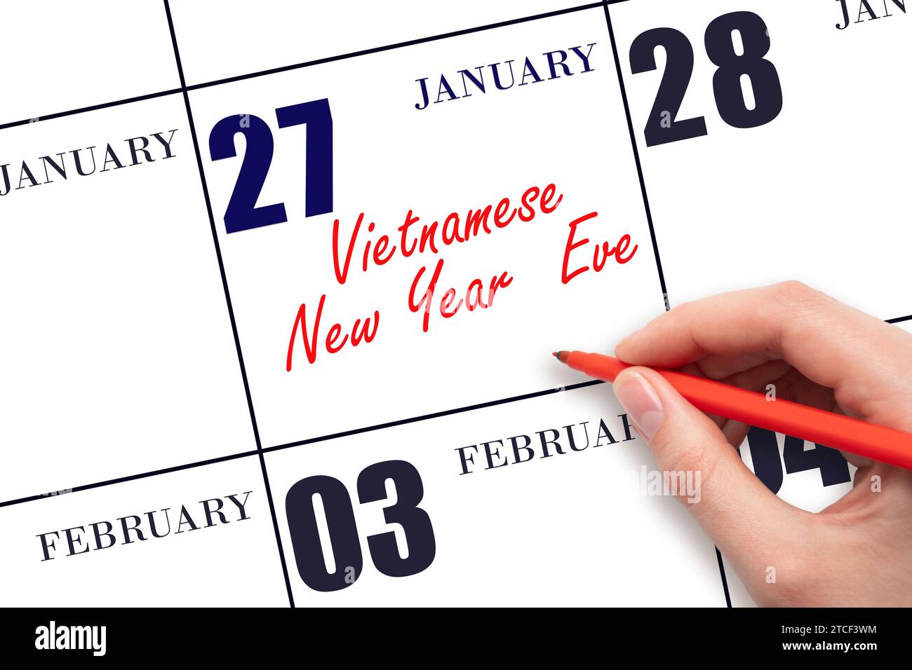 January 27. Hand writing text Vietnamese New Year Eve on calendar date. Save the date. Holiday. Day of the year concept. Stock Photo