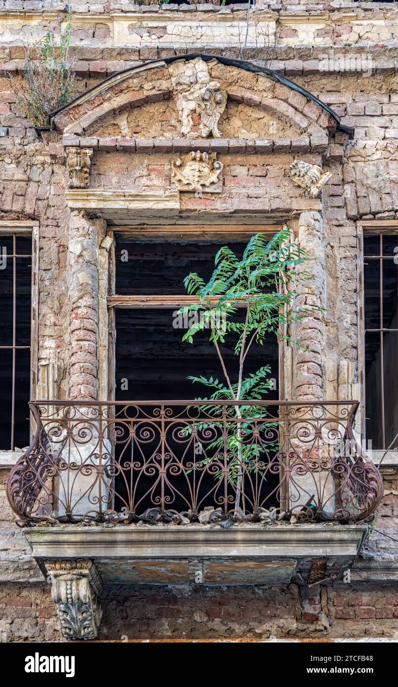 Detail with an old worn out building. Old vintage architecture in the