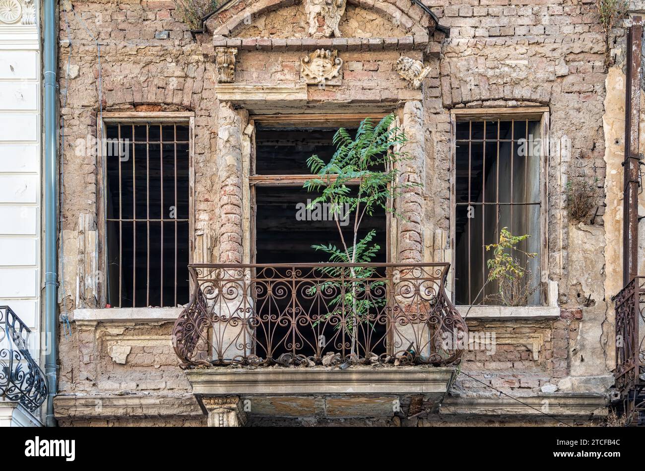 Detail with an old worn out building. Old vintage architecture in the