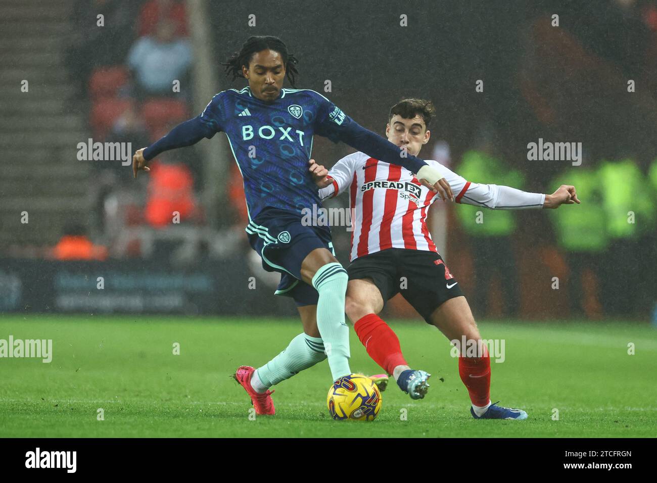 Djed Spence 39 of Leeds United tackled by Niall Huggins 2 of