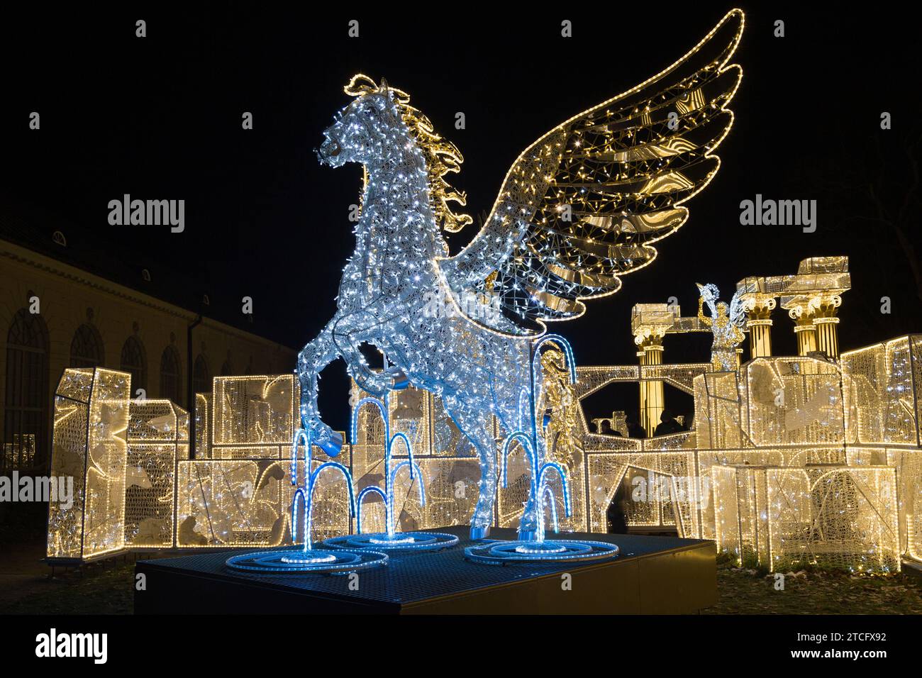 Warsaw, Poland - December 2, 2023: Winged Pegasus LED sculpture at Wilanow Royal Garden of Light, Warsaw, Poland. Stock Photo