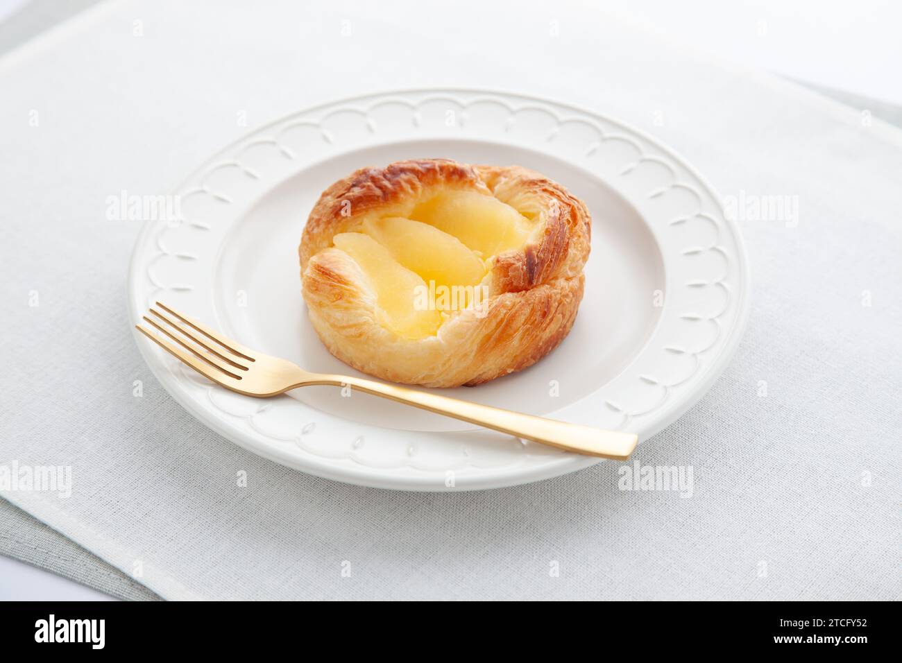 apple pie on plate on table Stock Photo