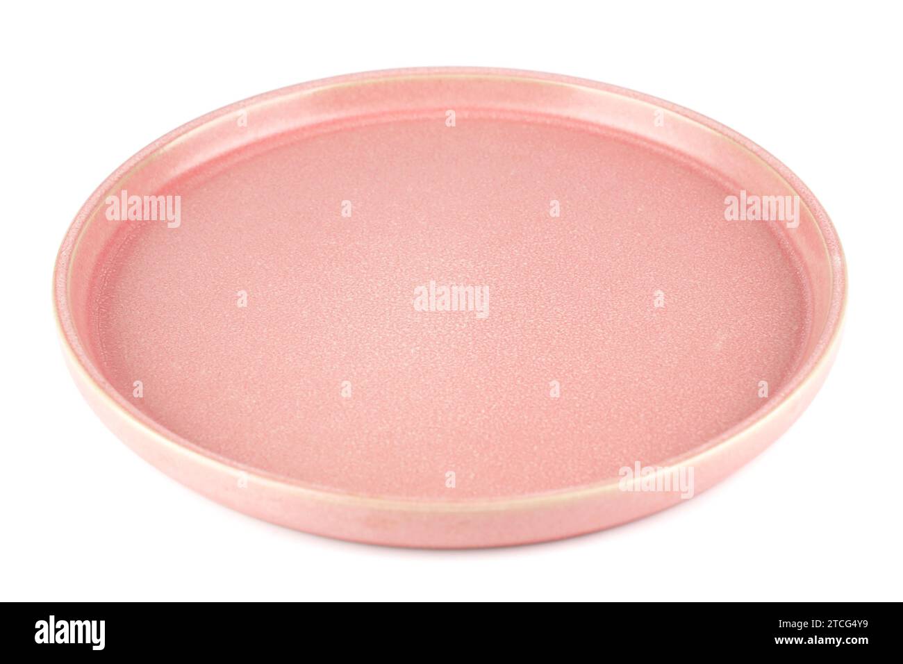 Ancient style pink empty plate isolated on white background. Stock Photo