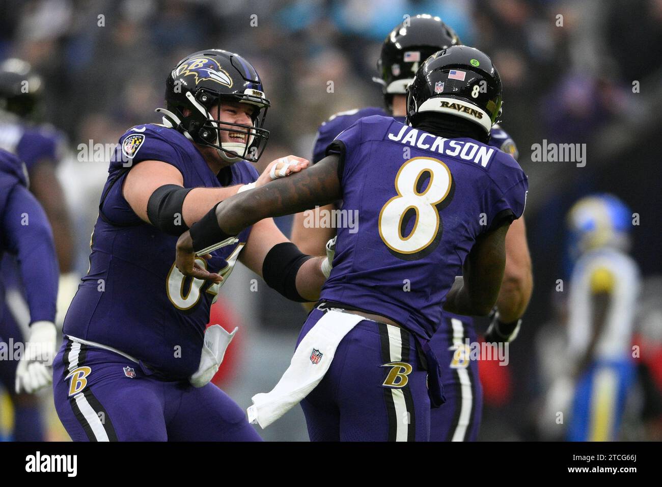 Baltimore Ravens center Tyler Linderbaum (64) and quarterback Lamar