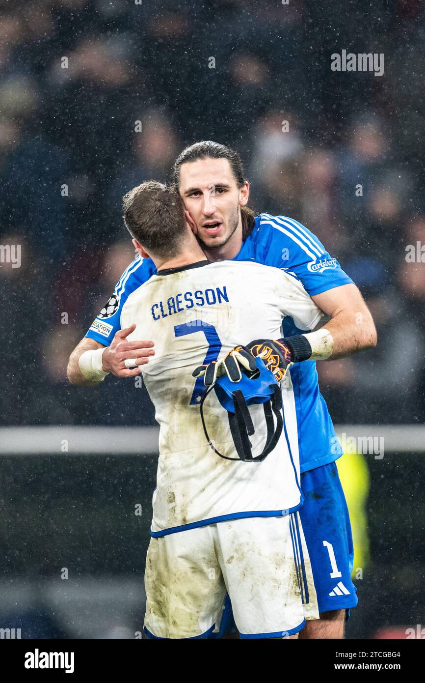 Copenhagen, Denmark. 12th Dec, 2023. Goalkeeper Kamil Grabara (1) and Viktor Claesson (7) of FC Copenhagen seen celebrating after the victory in the UEFA Champions League match between FC Copenhagen and Galatasaray at Parken in Copenhagen. (Photo Credit: Gonzales Photo/Alamy Live News Stock Photo