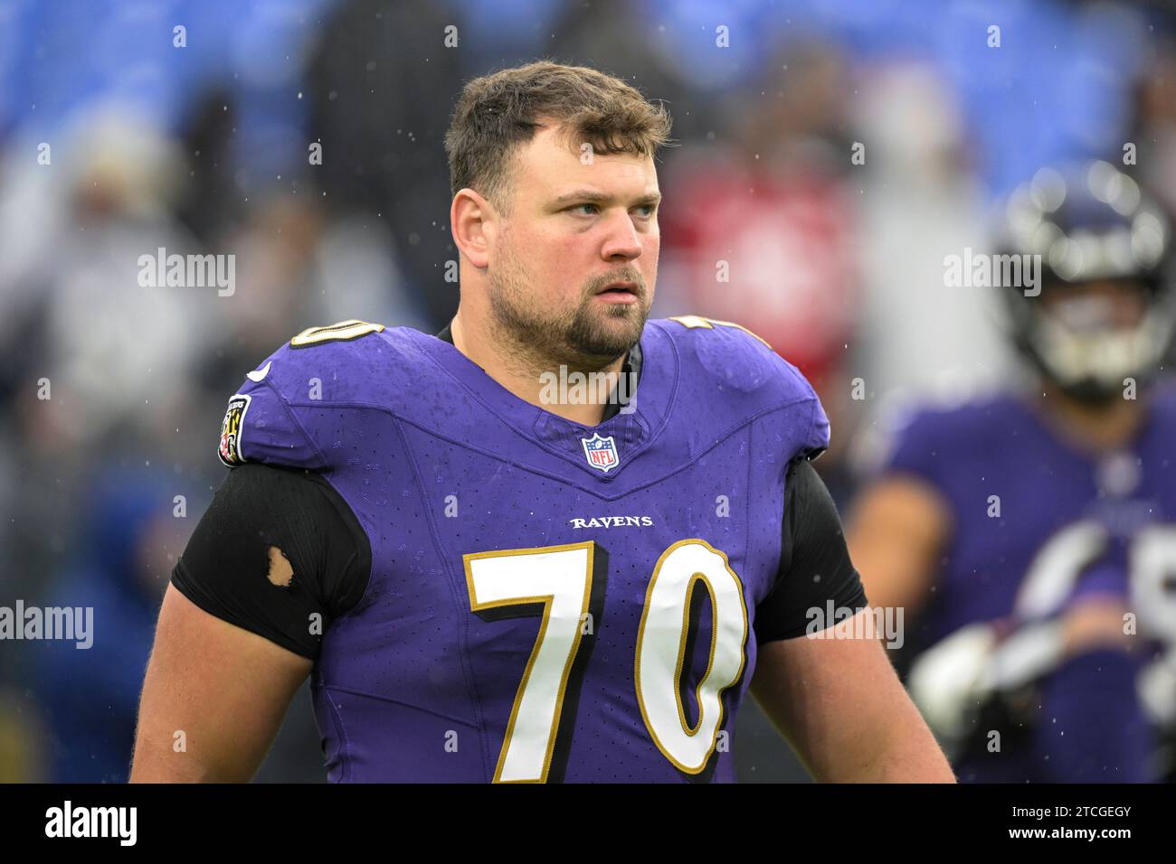 Baltimore Ravens guard Kevin Zeitler (70) looks on during pre-game warm ...