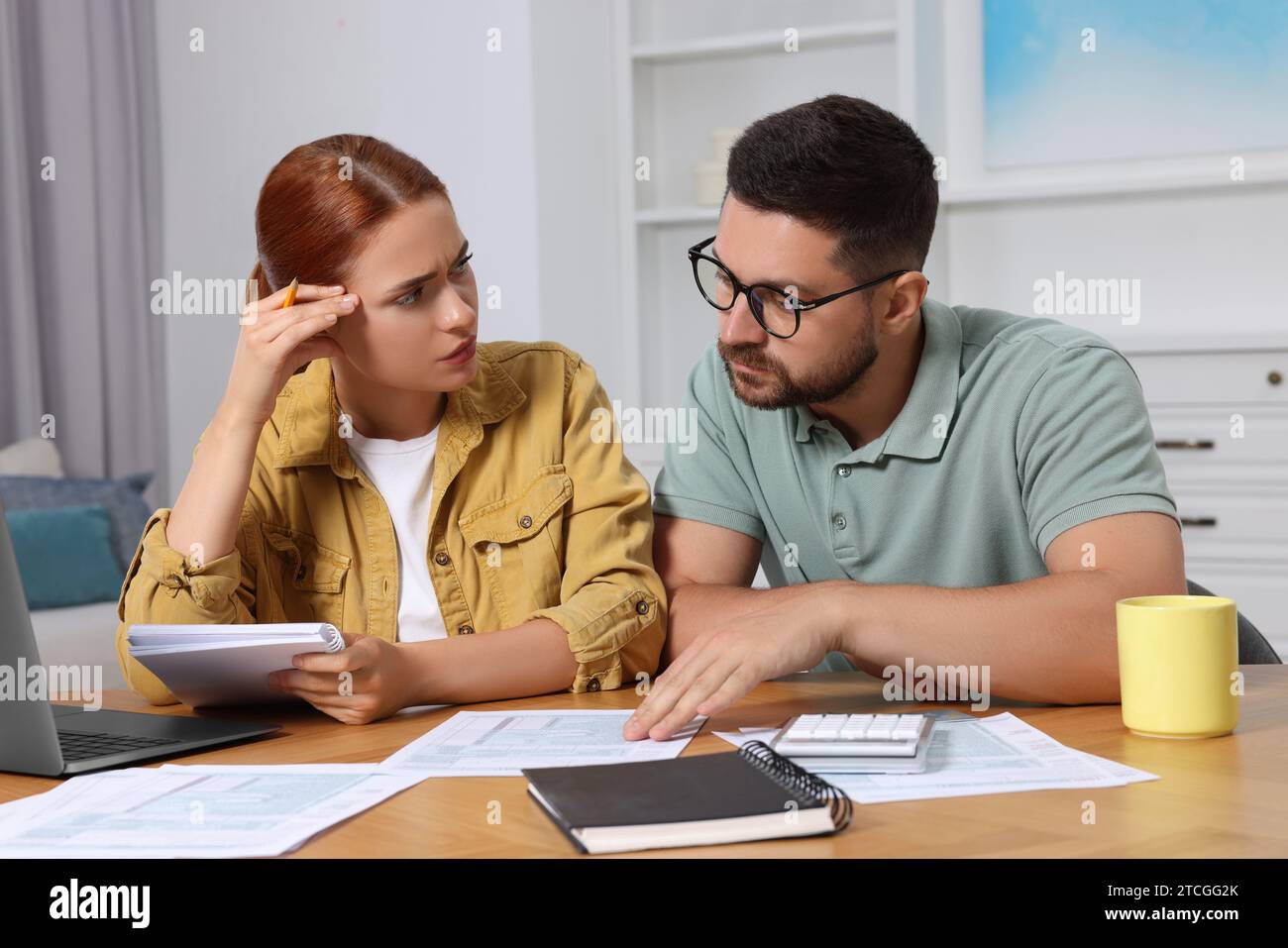 Calculating couple tax form hi-res stock photography and images - Alamy
