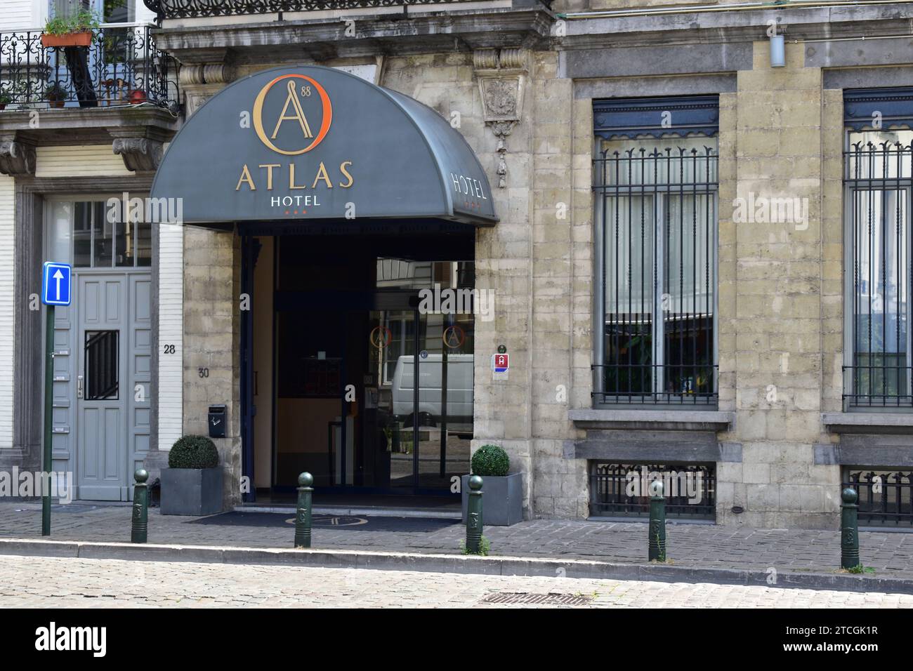 Main entrance and logo of three star hotel Atlas in the city centre of Brussels Stock Photo