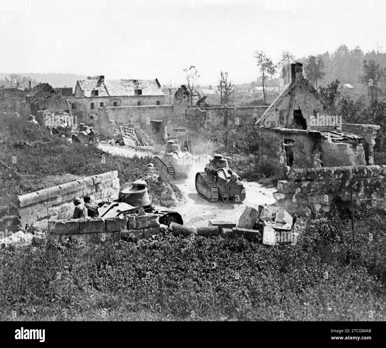 10/31/1918. On the French front of the Aisne. Modern type assault tanks passing through the ruins of a village. Credit: Album / Archivo ABC / Louis Hugelmann Stock Photo