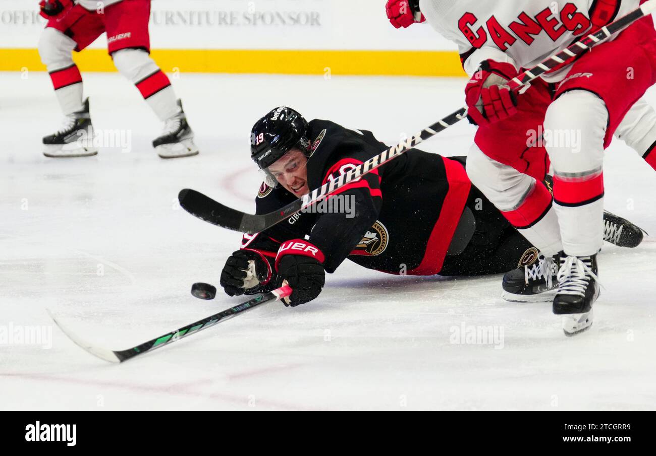 Batherson Ottawa Senators right wing Drake Batherson (19) reaches for the puck as ...