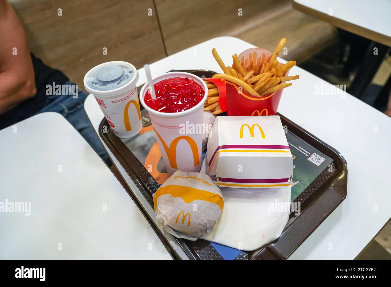 McDonald's is an American hamburger and fast food restaurant chain. The McDonald's logo has branches around the world. Thailand, Bangkok 04 december 2 Stock Photo