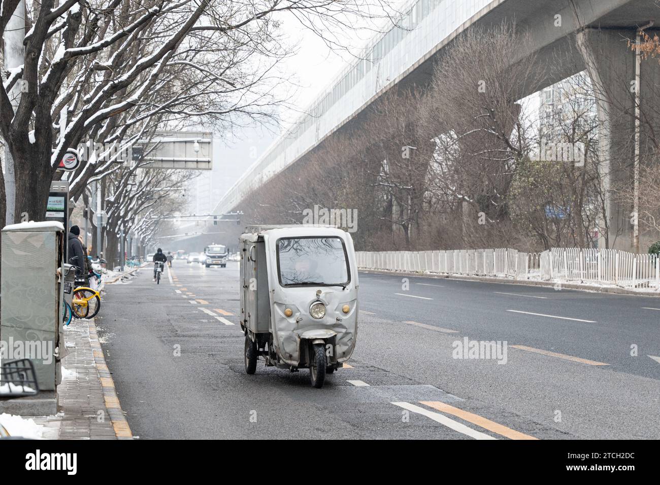 Beijing, China. 13 Dec, 2023. People of Beijing, commute to work on ...