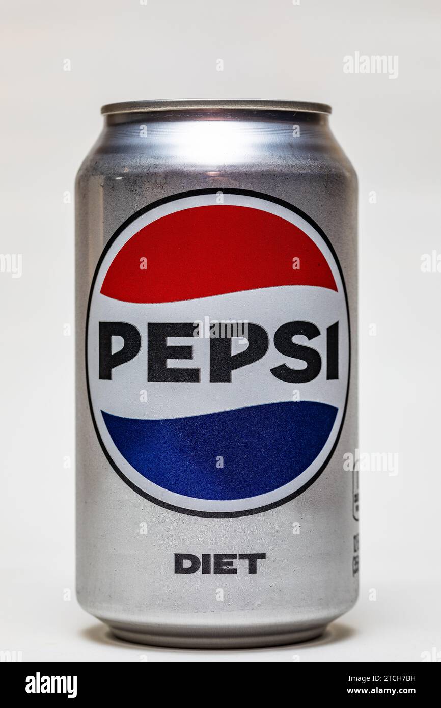 A can of Diet Pepsi on a light colored background with sunlight