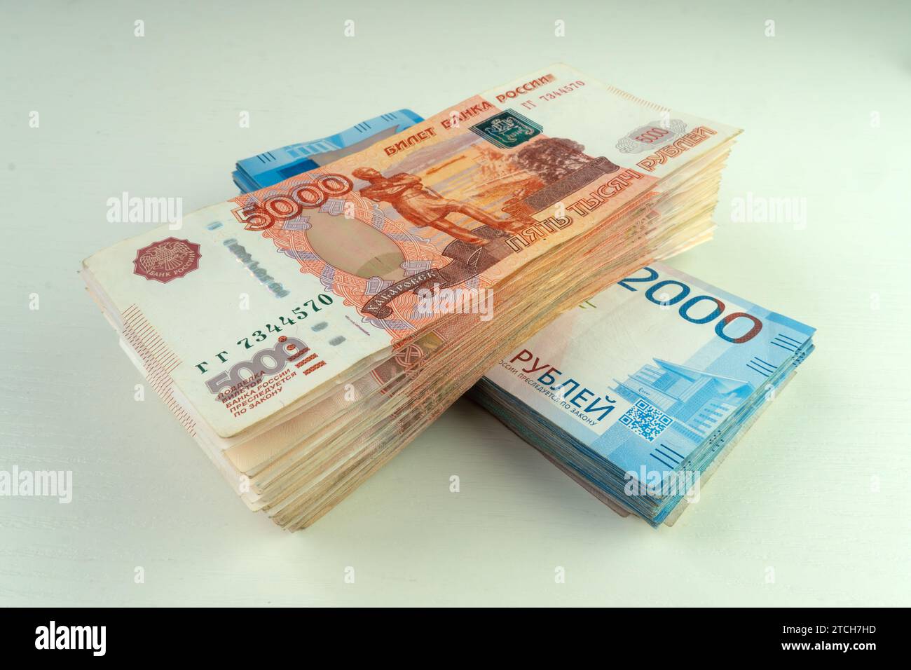 A big wad of money Russian banknotes on white background. Million