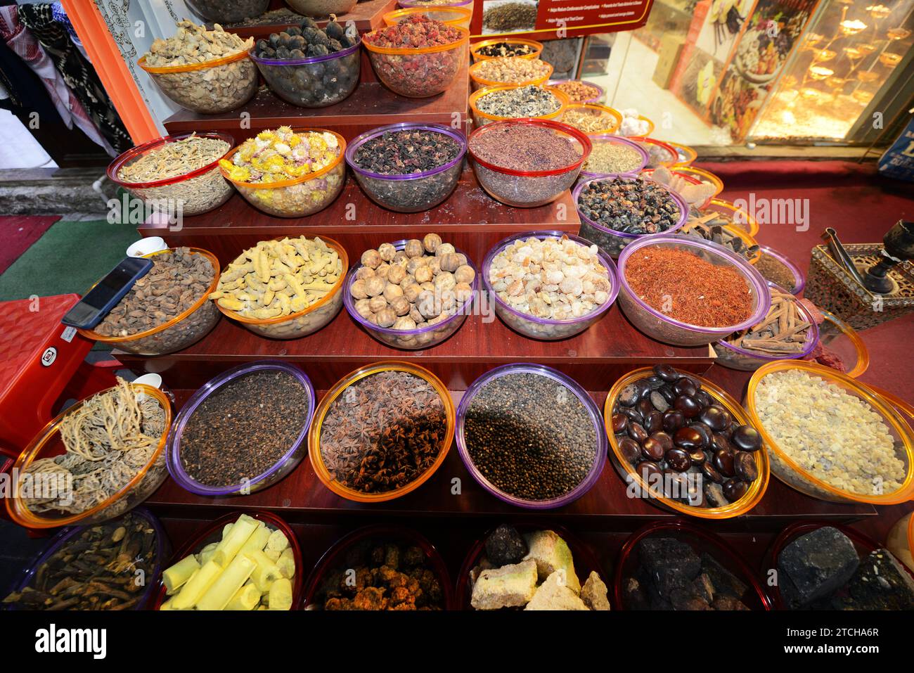 Spices displayed at a shop at the colorful Bur Dubai souq near the Dubai creek waterfont in old Dubai, UAE. Stock Photo
