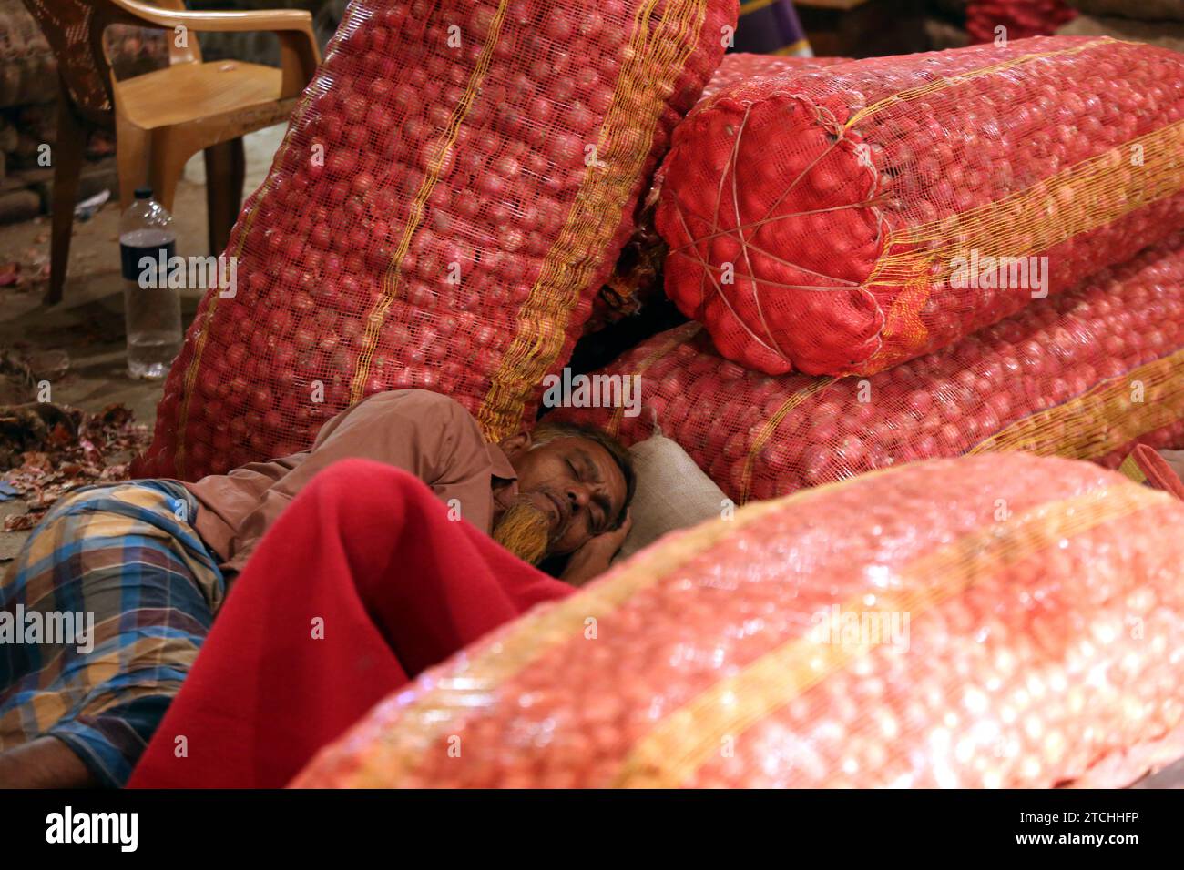 Dhaka, Wari, Bangladesh. 12th Dec, 2023. Bangladeshi vendor arranges