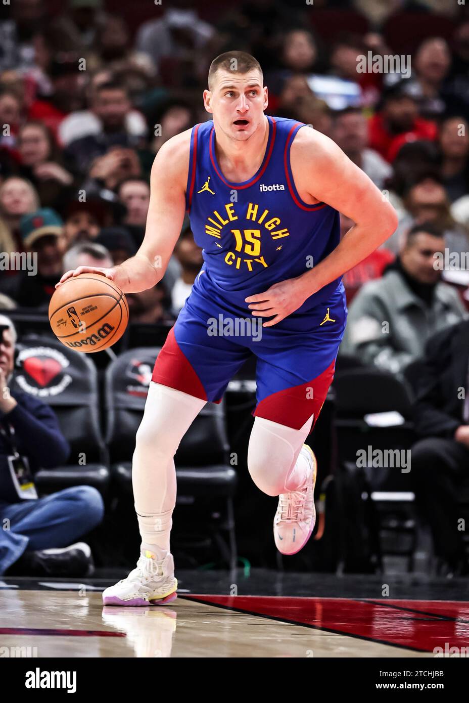 Chicago, USA. 12th Dec, 2025. Nikola Jokic of Denver Nuggets drives the