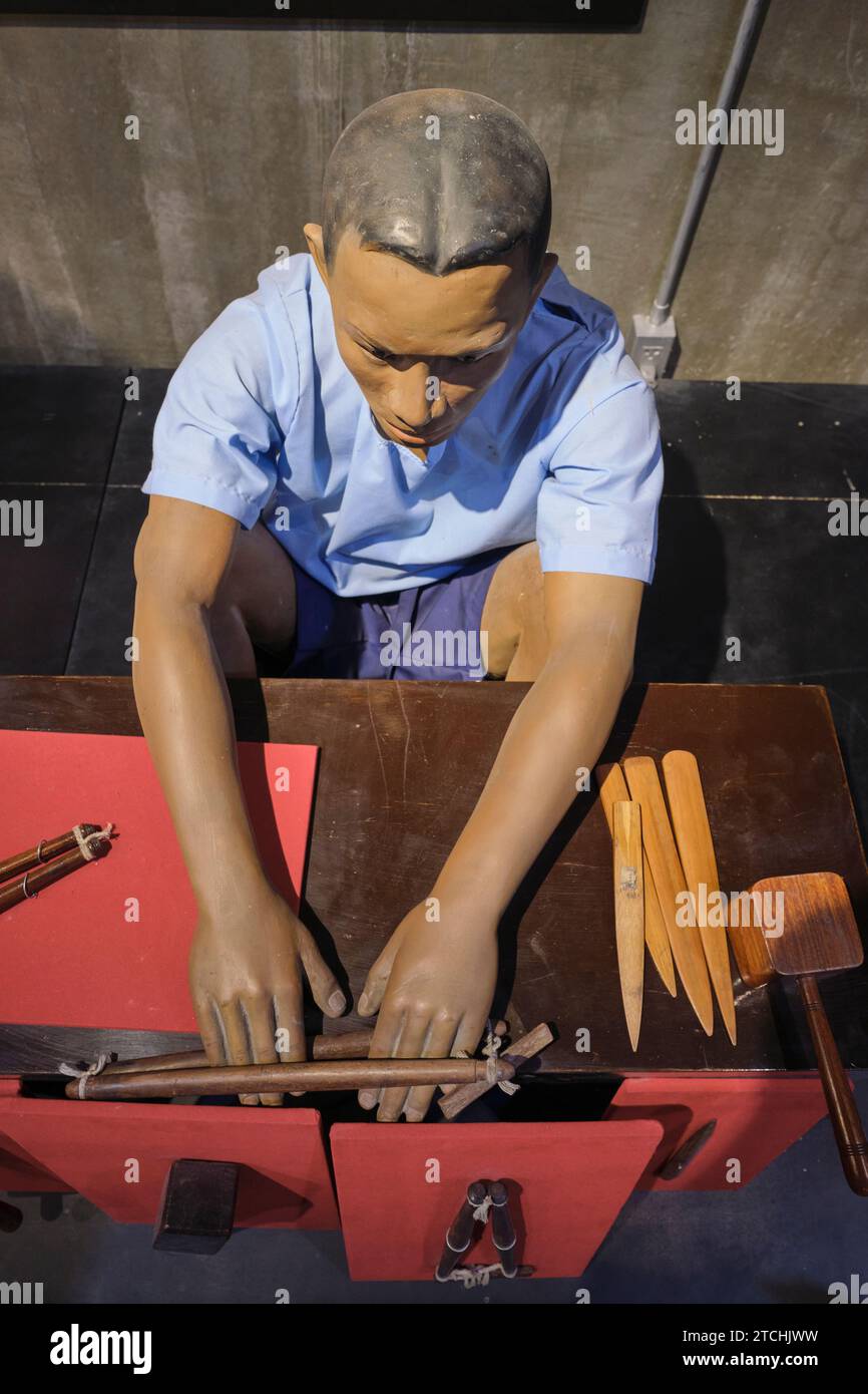 A display of a typical prisoner, his hands locked, prepared for a nail ...