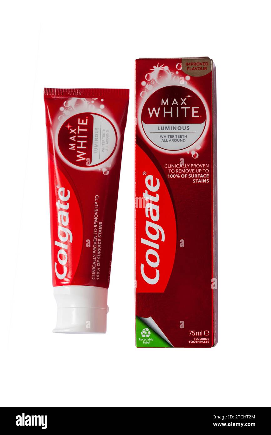 Box & tube of Colgate Max White Luminous Fluoride Toothpaste on white
