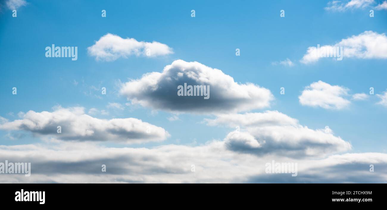 Blue sky with white clouds. Natural background. Cloudy day Stock Photo