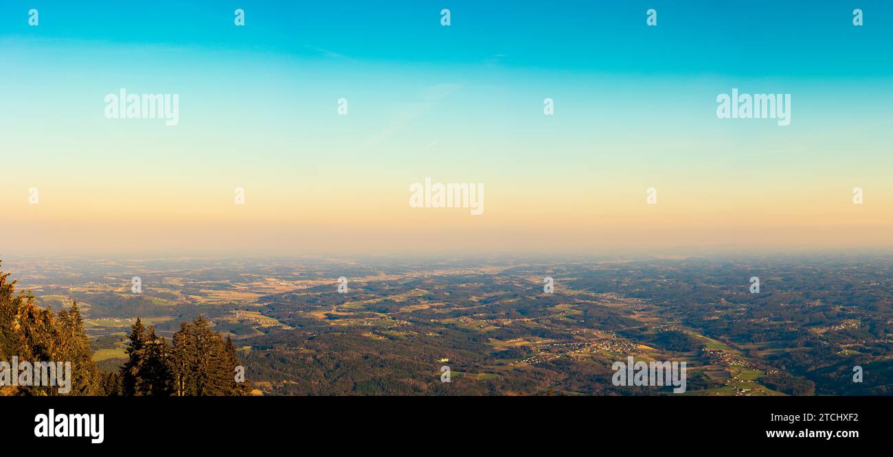 View from a peak of rocky Austrian mountain Schockl in Styria Graz. Place for tourism and hiking recreation Stock Photo