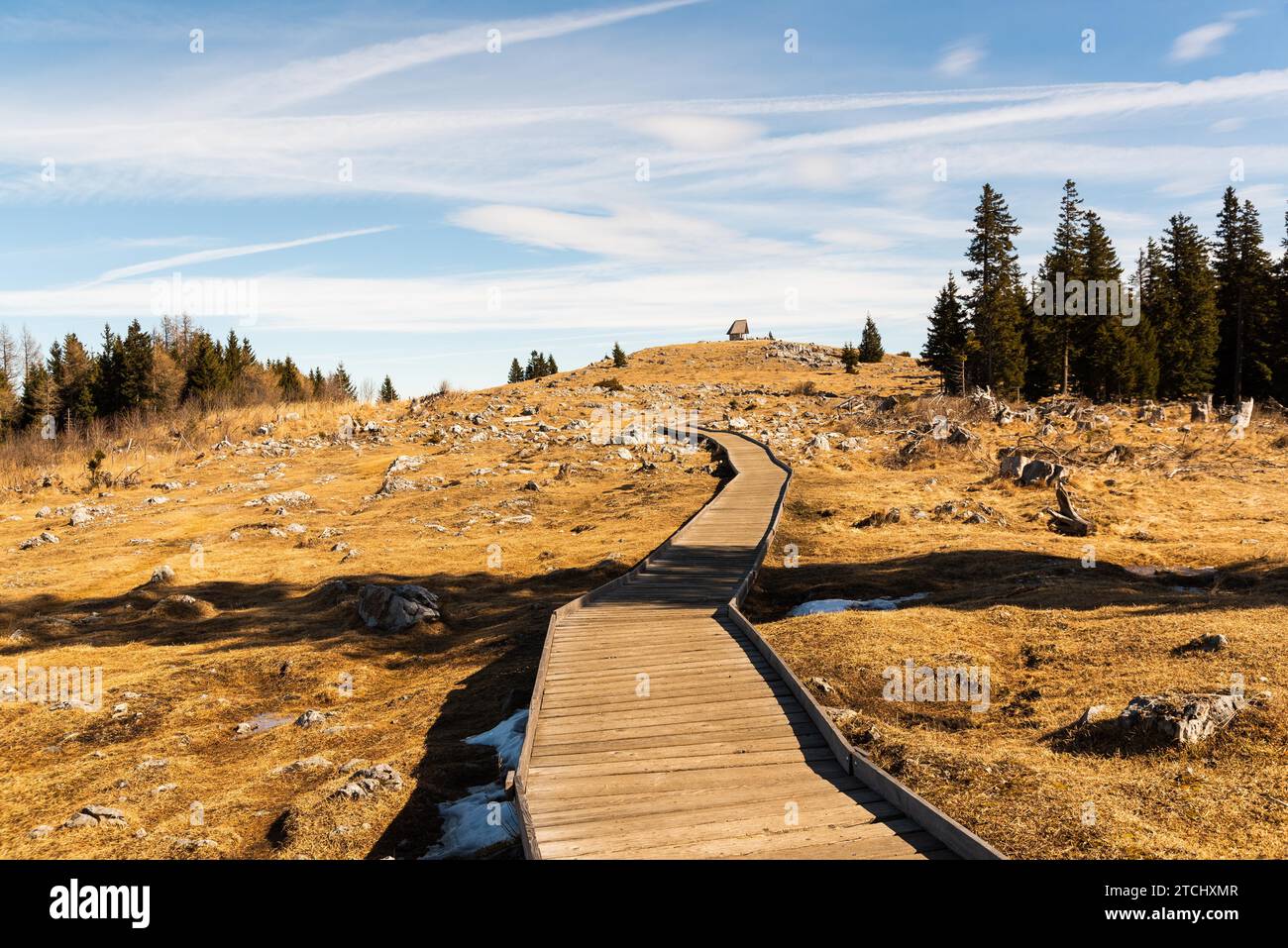 Wooden path at the top of schockl mountain in Graz Austria leading to view point. Mountain andscape Stock Photo