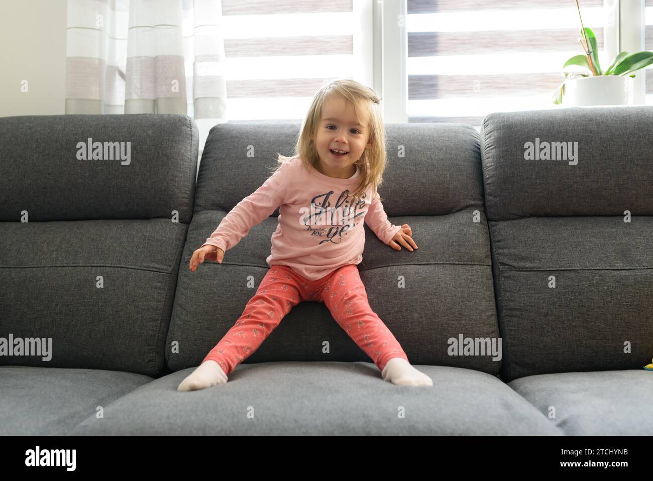 Year old girl on sofa hi res stock photography and images Alamy