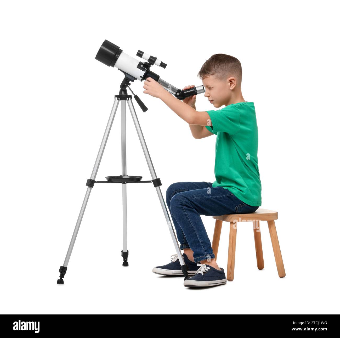 Little boy looking at stars through telescope on white background Stock ...
