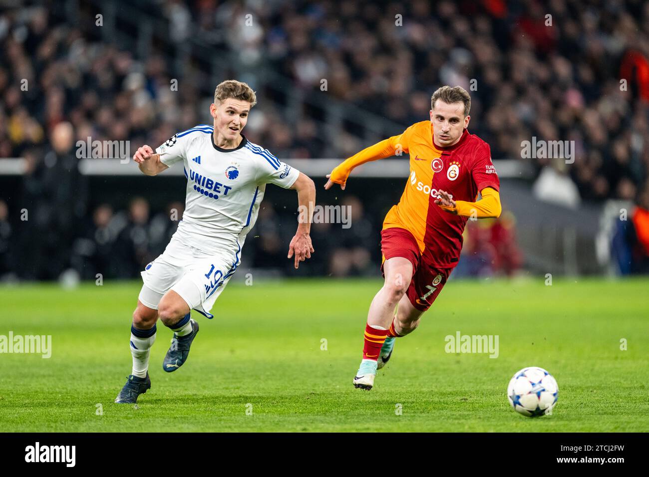 Copenhagen, Denmark. 12th Dec, 2023. Elias Jelert (19) of FC Copenhagen and Kerem Akturkoglu (7) of Galatasaray seen during the UEFA Champions League match between FC Copenhagen and Galatasaray at Parken in Copenhagen. (Photo Credit: Gonzales Photo/Alamy Live News Stock Photo