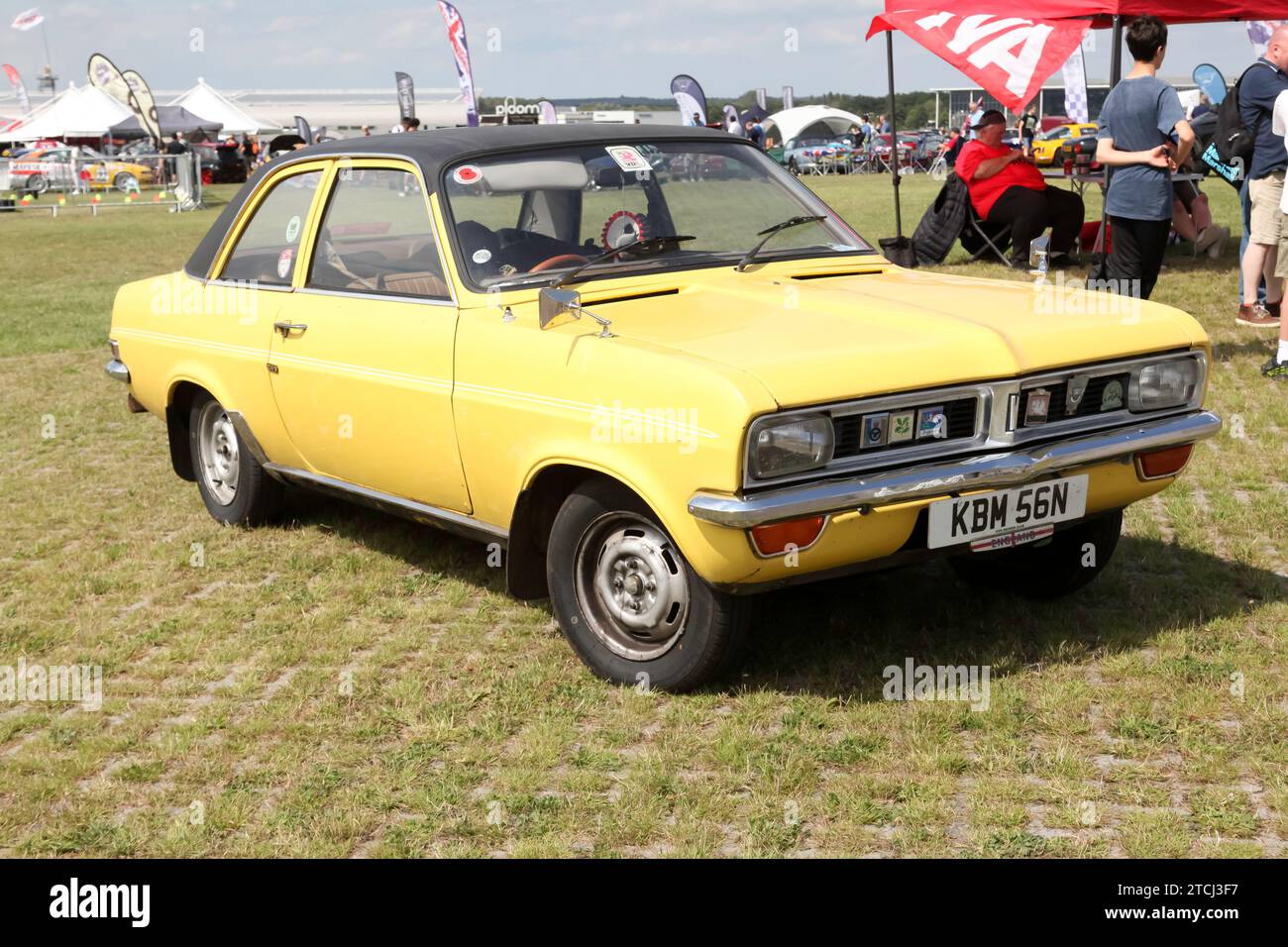 Three-quarters front view of a Yellow, 1975, Vauxhall Viva, on display at the 2023 British Motor Show, Farnborough Stock Photo