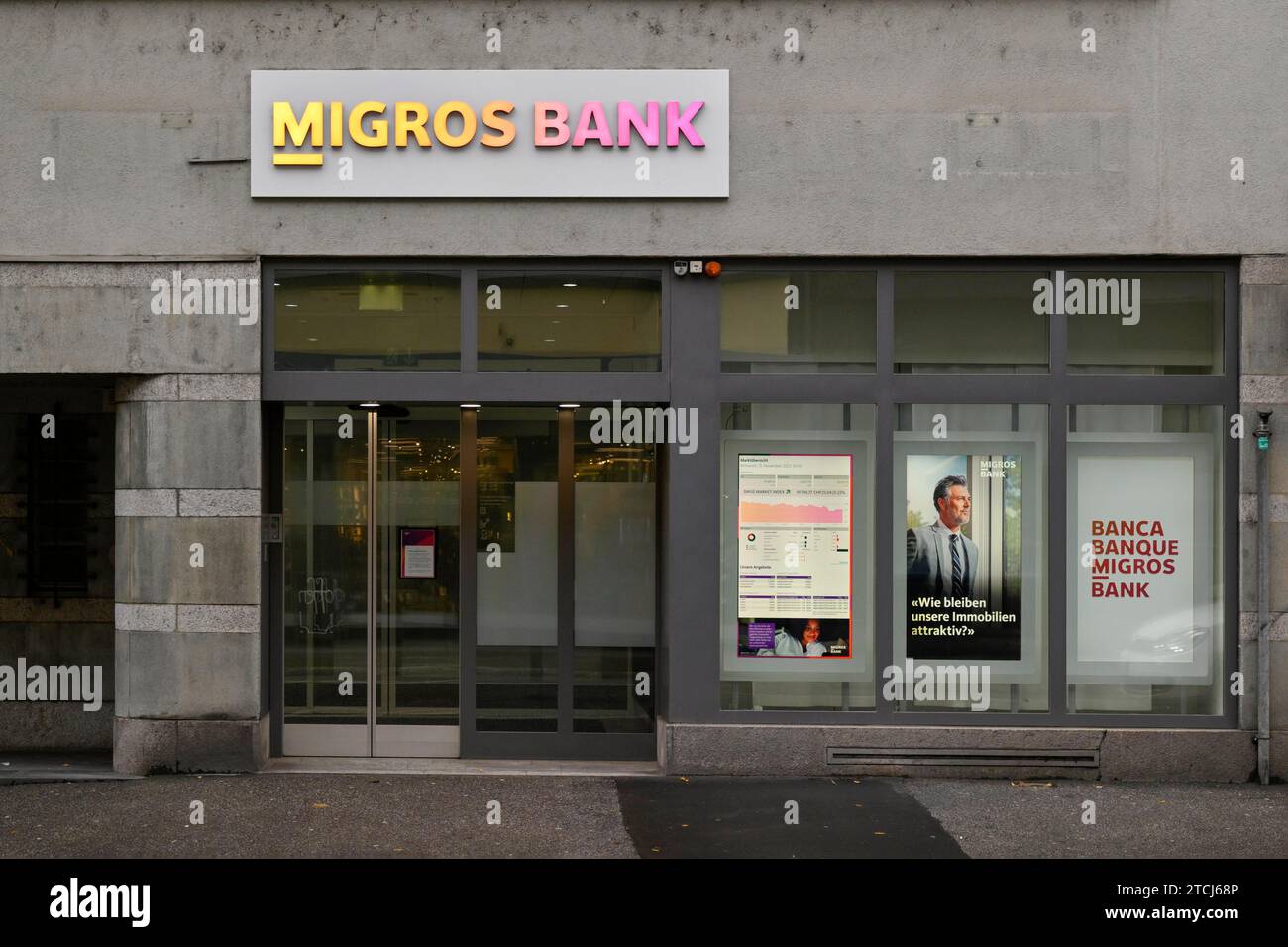 Entrance Migros Bank lettering Stock Photo