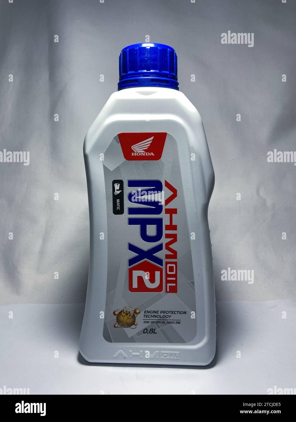 Surakarta, Indonesia - November 20, 2023 : MPX 2 AHM matic motor oil, engine protection technology 10W-30 SL JASO MB for matic motorcycle 800ml. Plast Stock Photo