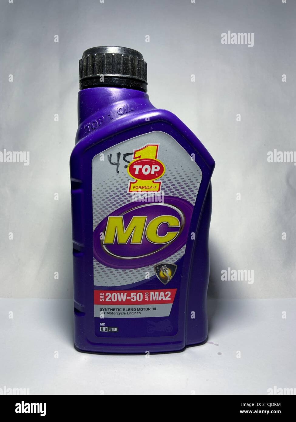 Surakarta, Indonesia - November 20, 2023 : Top one MC formula motor oil, SAE 20W-50 synthetic blend moto oil for motorcycle engines 800ml. Plastic bot Stock Photo