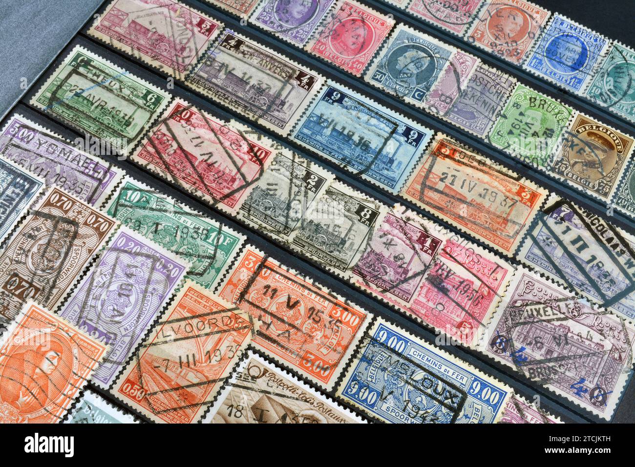 Cancelled postage stamps printed by Belgium, that show different motives from Belgium, circa 1900-1960. Stock Photo