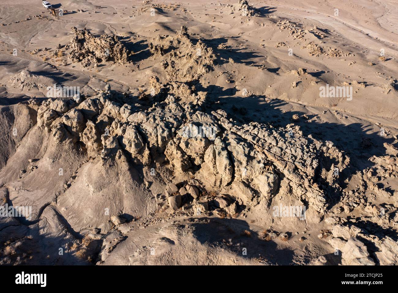 A visitor in the fantastically eroded sandstone formations in the ...