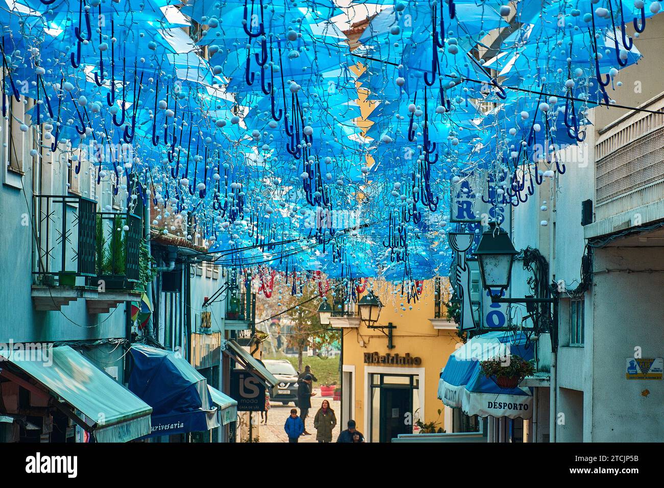 Very close to Aveiro is Águeda, a Portuguese town that until September 30 is decorated with brightly colored umbrellas thanks to the Umbrella Sky Proj Stock Photo