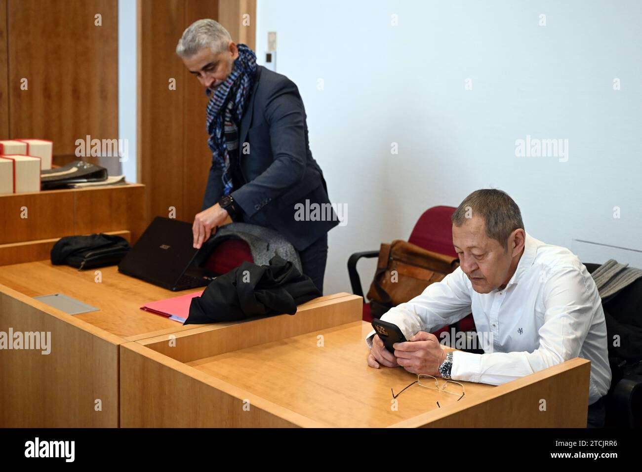 13 December 2023, North Rhine-Westphalia, Bonn: Author and blogger Akif Pirincci (r) and his lawyer Mustafa Kaplan wait in the courtroom of the district court for the trial to begin. Pirinçci is on trial for a blog entry in which he makes hostile remarks about immigrants. He is accused of incitement to hatred. Photo: Federico Gambarini/dpa Stock Photo