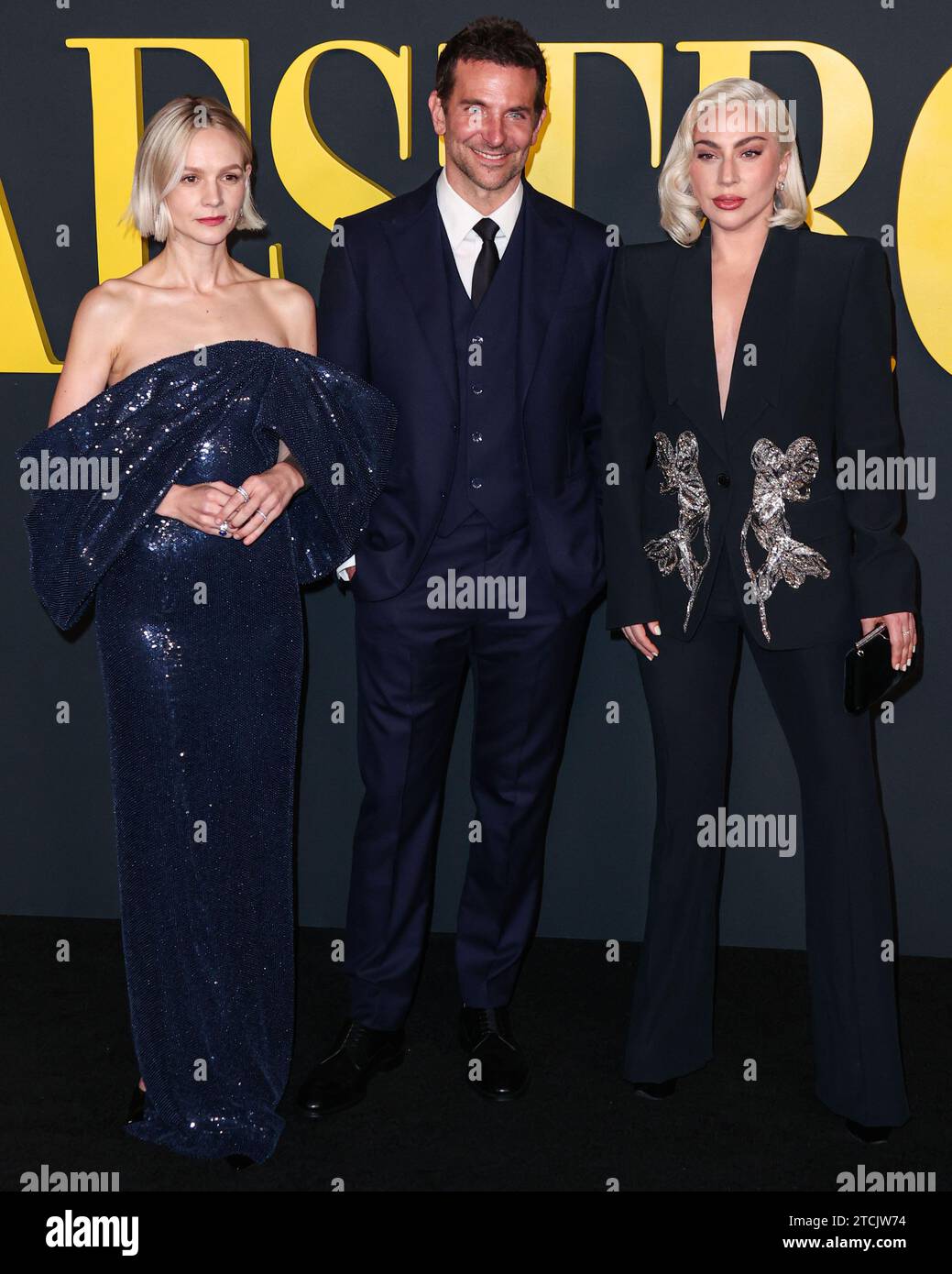 Los Angeles, United States. 12th Dec, 2023. LOS ANGELES, CALIFORNIA, USA - DECEMBER 12: English actress Carey Mulligan wearing a Celine dress, American actor and filmmaker Bradley Cooper wearing a Louis Vuitton suit and American singer, songwriter and actress Lady Gaga wearing an Alexander McQueen suit arrive at the Los Angeles Special Screening Of Netflix's 'Maestro' held at the Academy Museum of Motion Pictures on December 12, 2023 in Los Angeles, California, United States. (Photo by Xavier Collin/Image Press Agency) Credit: Image Press Agency/Alamy Live News Stock Photo