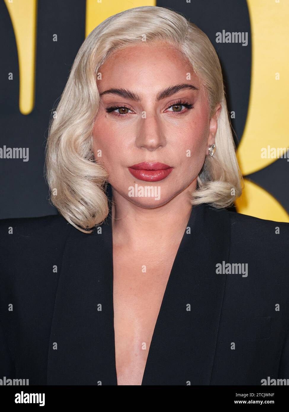 Los Angeles, United States. 12th Dec, 2023. LOS ANGELES, CALIFORNIA, USA - DECEMBER 12: American singer, songwriter and actress Lady Gaga (Stefani Joanne Angelina Germanotta) wearing an Alexander McQueen suit arrives at the Los Angeles Special Screening Of Netflix's 'Maestro' held at the Academy Museum of Motion Pictures on December 12, 2023 in Los Angeles, California, United States. (Photo by Xavier Collin/Image Press Agency) Credit: Image Press Agency/Alamy Live News Stock Photo