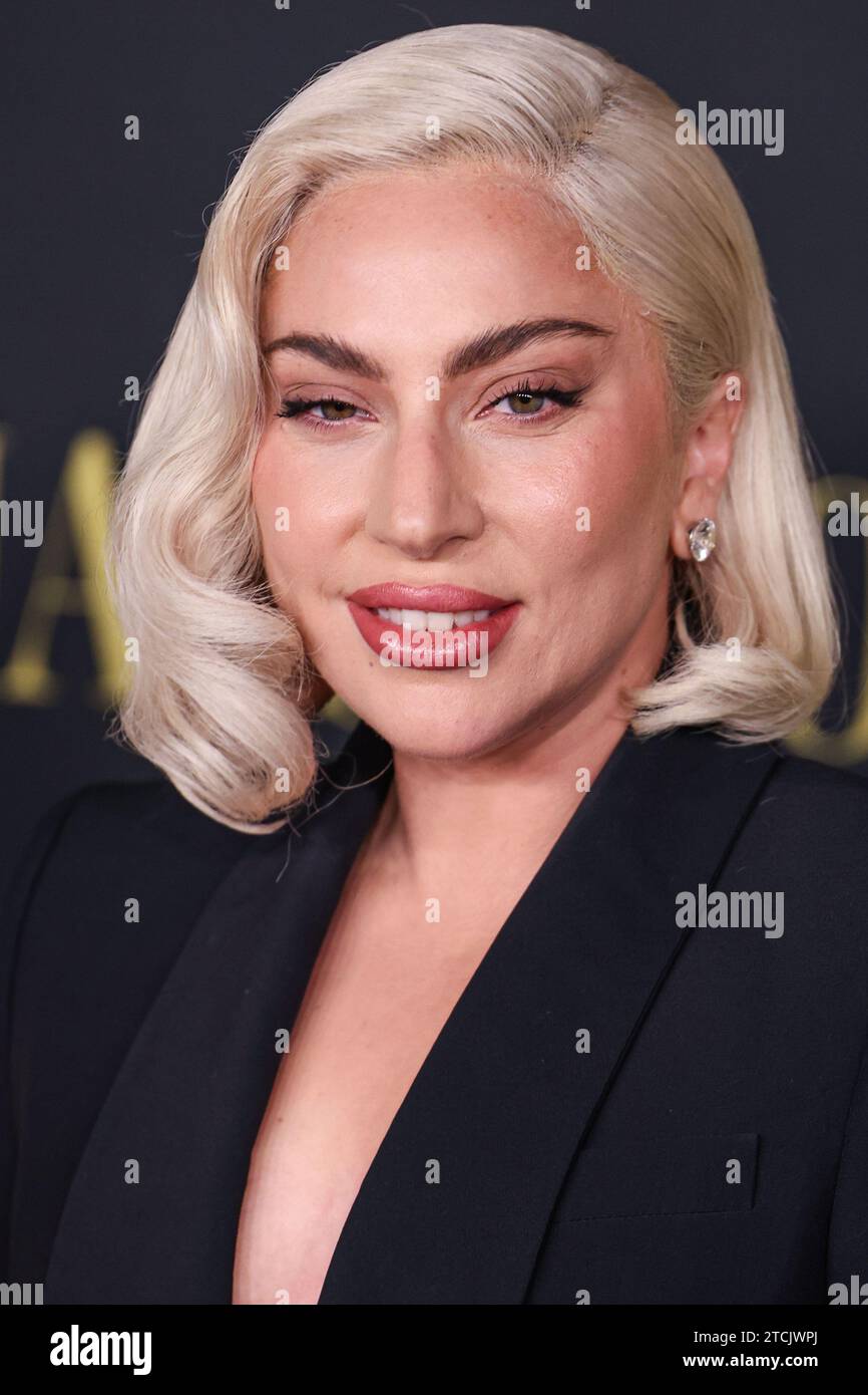 Los Angeles, United States. 12th Dec, 2023. LOS ANGELES, CALIFORNIA, USA - DECEMBER 12: American singer, songwriter and actress Lady Gaga (Stefani Joanne Angelina Germanotta) wearing an Alexander McQueen suit arrives at the Los Angeles Special Screening Of Netflix's 'Maestro' held at the Academy Museum of Motion Pictures on December 12, 2023 in Los Angeles, California, United States. (Photo by Xavier Collin/Image Press Agency) Credit: Image Press Agency/Alamy Live News Stock Photo