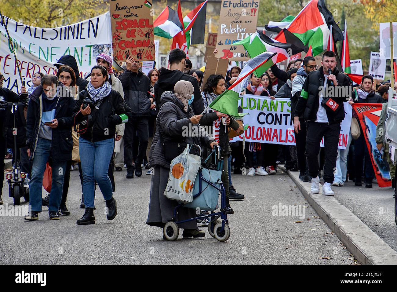 Marseille, France. 9th Dec, 2023. Pro-Palestinian demonstrators with banners, placards and flags chant slogans as they march through the streets of Marseille. First banned by the Bouches-du-RhÃ´ne police headquarters due to serious risks of disturbing public order, the demonstration for a ceasefire in Gaza took place without incident following a decision by the Administrative Court. (Credit Image: © Gerard Bottino/SOPA Images via ZUMA Press Wire) EDITORIAL USAGE ONLY! Not for Commercial USAGE! Stock Photo