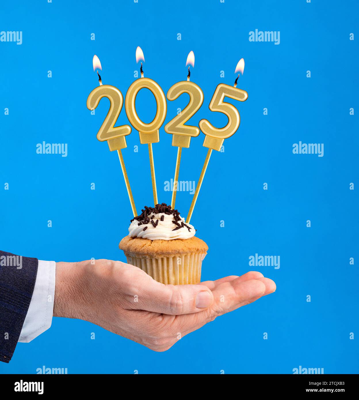 Happy New Year 2025 Candles in the form of lit numbers Stock Photo
