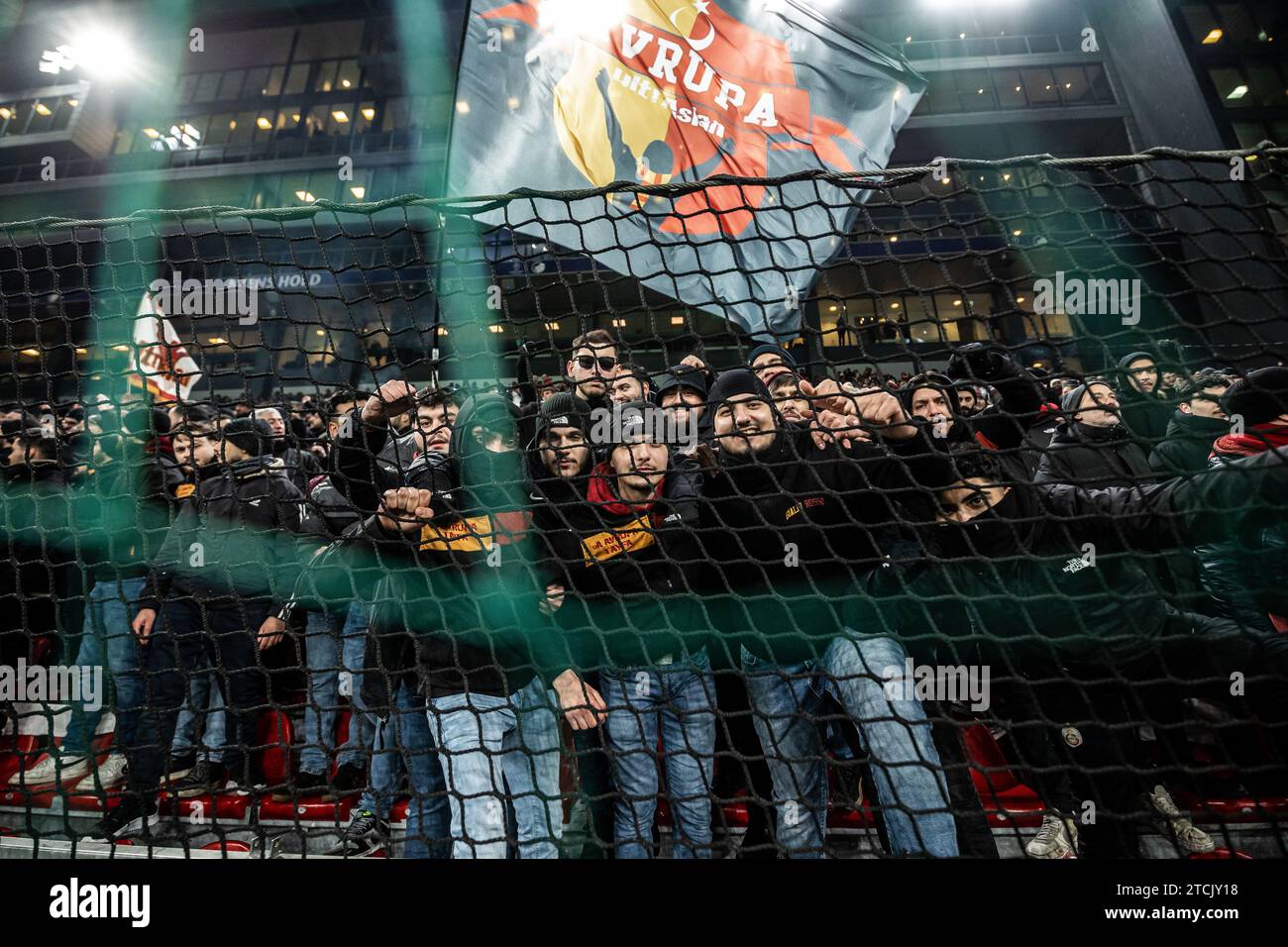 Copenhagen, Denmark. 12th Dec, 2023. Football fans of Galatasaray seen on the stands during the UEFA Champions League match between FC Copenhagen and Galatasaray at Parken in Copenhagen. (Photo Credit: Gonzales Photo/Alamy Live News Stock Photo