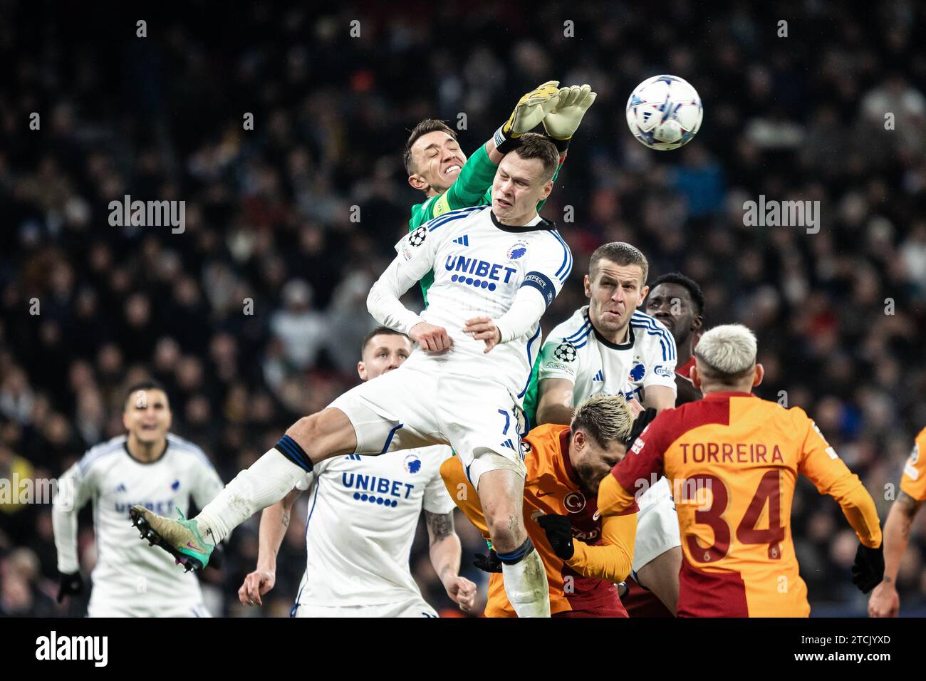 Copenhagen, Denmark. 12th Dec, 2023. Goalkeeper Fernando Muslera (1) of Galatasaray and Viktor Claesson (7) of FC Copenhagen seen during the UEFA Champions League match between FC Copenhagen and Galatasaray at Parken in Copenhagen. (Photo Credit: Gonzales Photo/Alamy Live News Stock Photo
